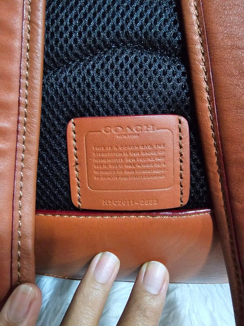 Backpack Coach (Category: Luxury Bags & Wallets) located in Cavite. Submitted by liveriver_514fd1 (Listing ID 1457746000, Image 3). Description: - Authentic Coach Backpack bag - Signature canvas with brown leather trim - Convenient front zip pocket - Adjustable strap for a custom fit - Breathable padded mesh back panel - Ideal for everyday carry.