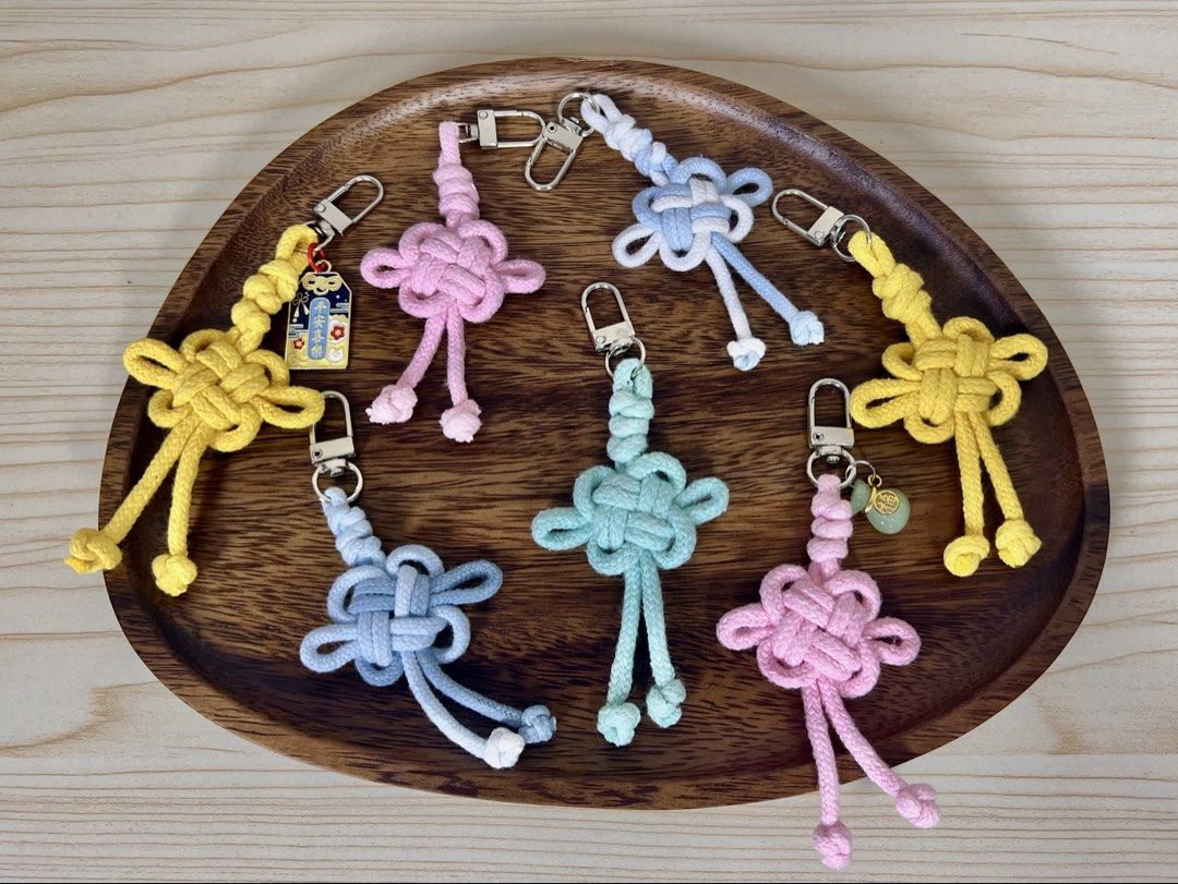Custom Keychains (Category: Charms) located in Singapore. Submitted by thetreasuretrovez (Listing ID 1457813213, Image 3). Description: Handmade knotted accessories: - Keychains with custom charms - Fortune knot keychains - Flower knot keychains - Phone straps - Lanyards Strap colours are customisable. Free teacher’s day gift tags for teacher’s day orders. Find us at lovepopo.sg on instagram 💜 Pop-up at Bukit Batok 29-30 Aug — CUSTOM KEYCHAIN ST