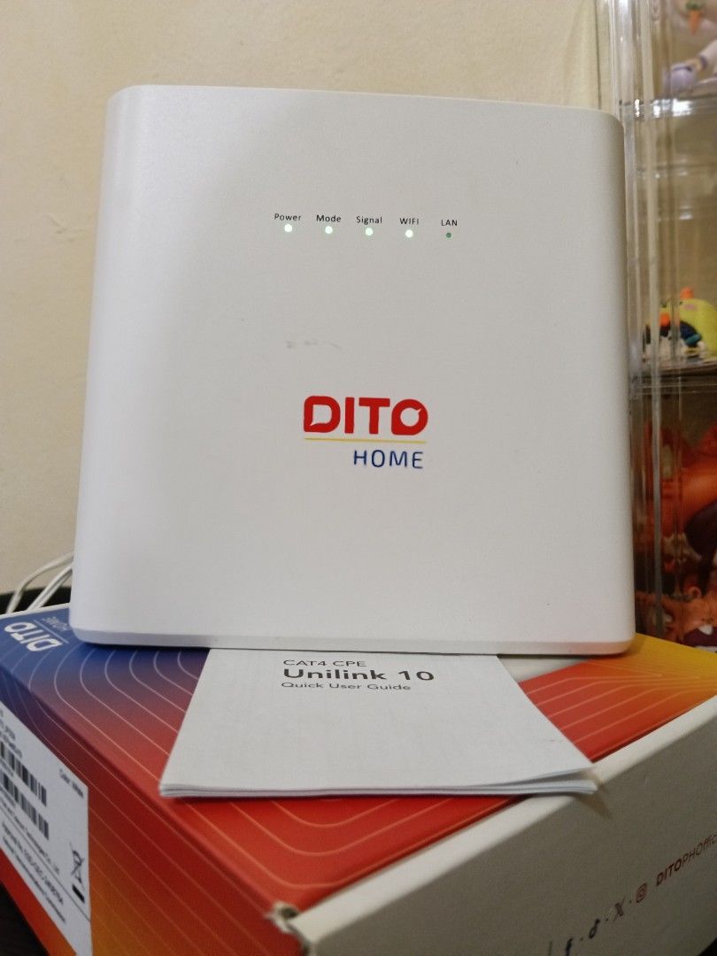 DITO Home WiFi Modem Unilink 10 (Category: Networking) located in Quezon City. Submitted by bluemyx14 (Listing ID 1457817985, Image 3). Description: - DITO Home WiFi modem (Unilink 10) - Includes power adapter and quick user guide - All indicator lights are on, confirming it's working - Perfect for setting up your home internet connection.