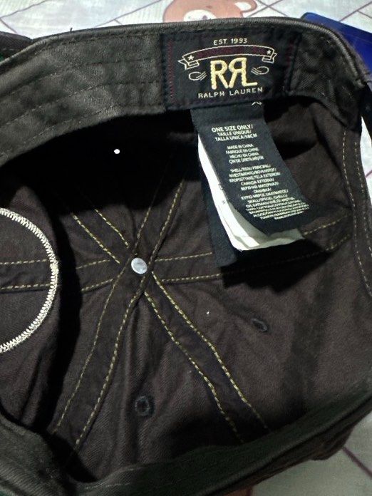 Double RL RRL Brown Baseball Cap (Category: Caps & Hats) located in Himamaylan. Submitted by gapasalways (Listing ID 1456198744, Image 2). Description: - Brand: Vintage RRL Ralph Lauren - Design: Circular patch with wings and 'RRL' lettering - Size: One size fits most - Style: Great for everyday wear.