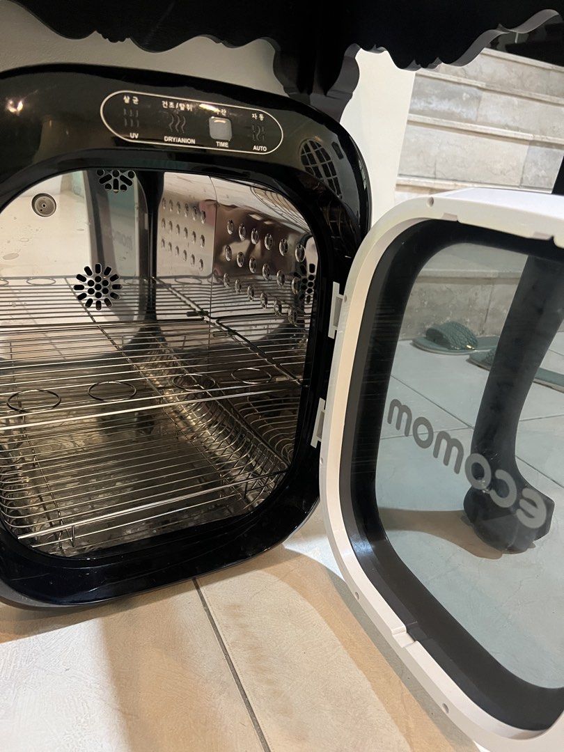 Ecomom ECO 33 Sterilizer Dryer (Category: Breastfeeding & Bottle Feeding) located in Cebu City. Submitted by jona575 (Listing ID 1457836004, Image 3). Description: - Ecomom Sterilizer and Dryer (Model ECO 33) - Sterilizes using UV light - Removes odors with anion technology - Dries items effectively - Features an auto-cycle function - Ideal for baby bottles, toys, and more - User-friendly with a timer display - Ensures items are kept clean and dr