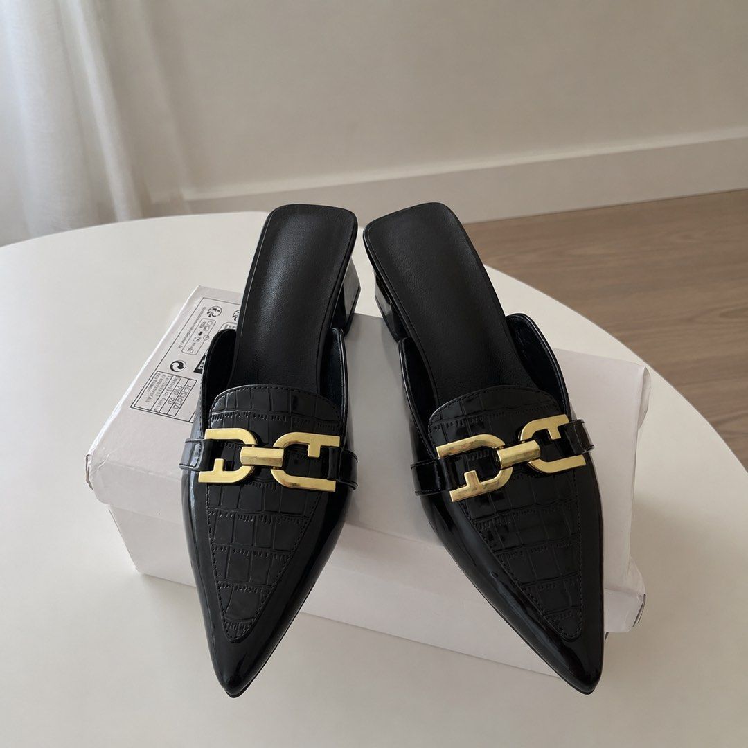 Elegant Black Crocodile Embossed Mule (Category: Loafers) located in Manila. Submitted by cremehaul (Listing ID 1457890494, Image 1). Description: 24 cm Good as new In good condition With gold metal hardware Yayamanin in person! Ang mahal ko na nabili yan sa app 1K plus 🥹 High quality!.