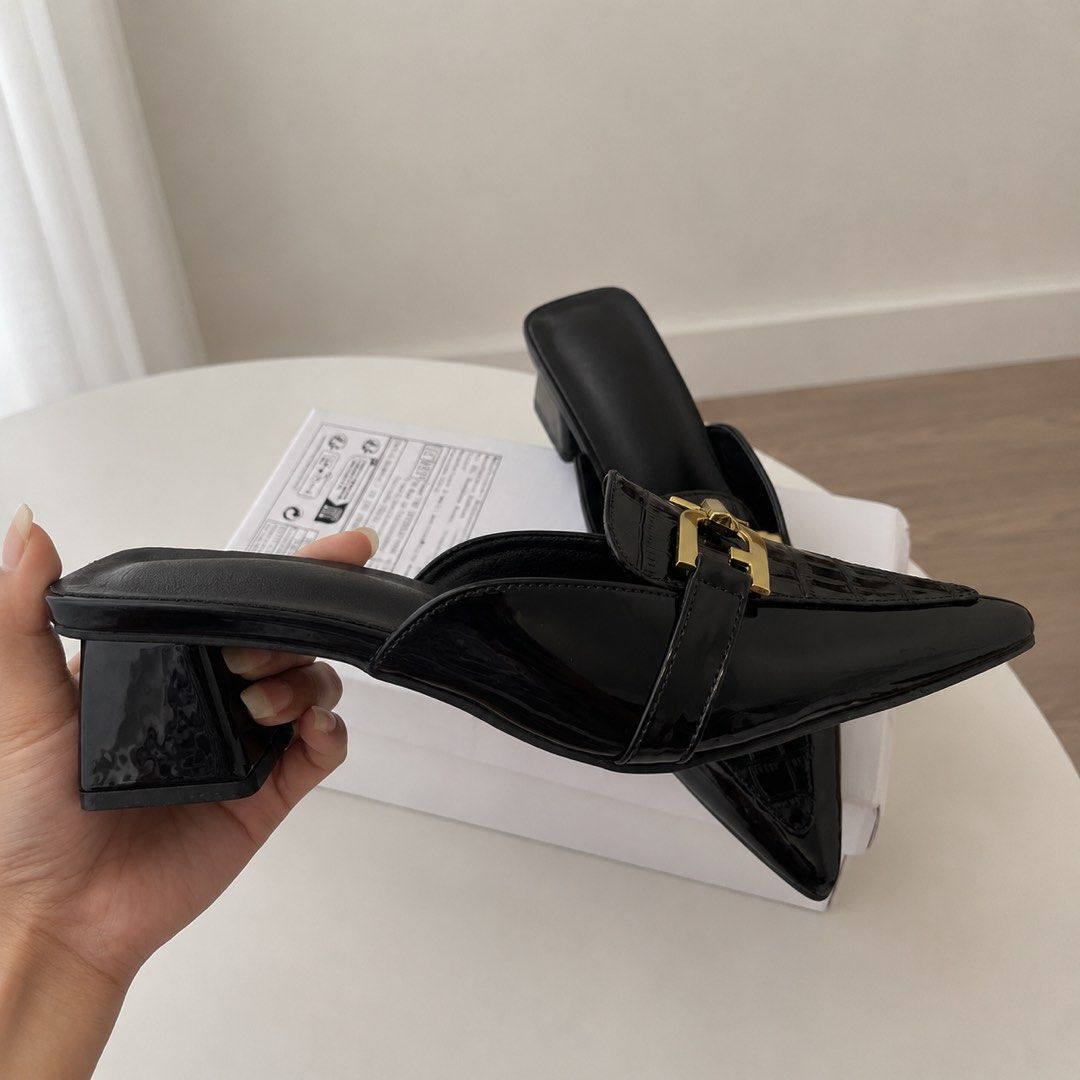 Elegant Black Crocodile Embossed Mule (Category: Loafers) located in Manila. Submitted by cremehaul (Listing ID 1457890494, Image 2). Description: 24 cm Good as new In good condition With gold metal hardware Yayamanin in person! Ang mahal ko na nabili yan sa app 1K plus 🥹 High quality!.