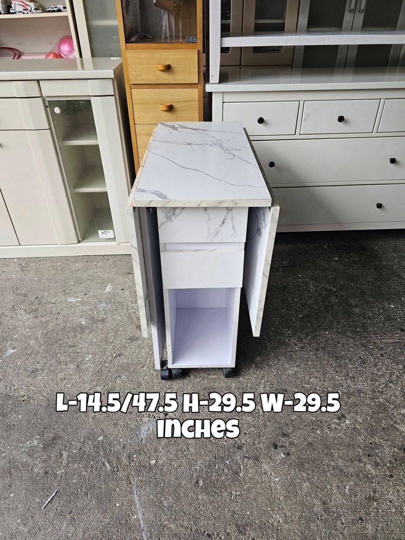 Expandable Table (Glossy) (Category: Tables & Sets) located in Quezon City. Submitted by ledamadel (Listing ID 1457898424, Image 1). Description: Expandable Table (Glossy) ✔️L-14.5/47.5 H-29.5 W-29.5 inches 📐 ✔1 Door and 2 Drawers 🗄 ✔️Laminated 🔖 ✔️Compress & Mdf 🪵 ✔Scratches As-is! 👌 Location: 40 Aplaya St Napocor Vill. Tandang Sora Quezon City. For inquiry please Pm us or Call. 09066885859 Please like our page thanks! 👇👇👇👇 KMA O’shop #