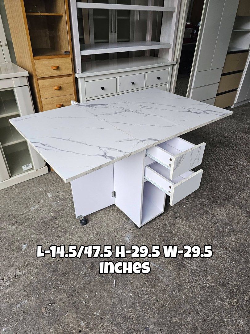 Expandable Table (Glossy) (Category: Tables & Sets) located in Quezon City. Submitted by ledamadel (Listing ID 1457898424, Image 2). Description: Expandable Table (Glossy) ✔️L-14.5/47.5 H-29.5 W-29.5 inches 📐 ✔1 Door and 2 Drawers 🗄 ✔️Laminated 🔖 ✔️Compress & Mdf 🪵 ✔Scratches As-is! 👌 Location: 40 Aplaya St Napocor Vill. Tandang Sora Quezon City. For inquiry please Pm us or Call. 09066885859 Please like our page thanks! 👇👇👇👇 KMA O’shop #