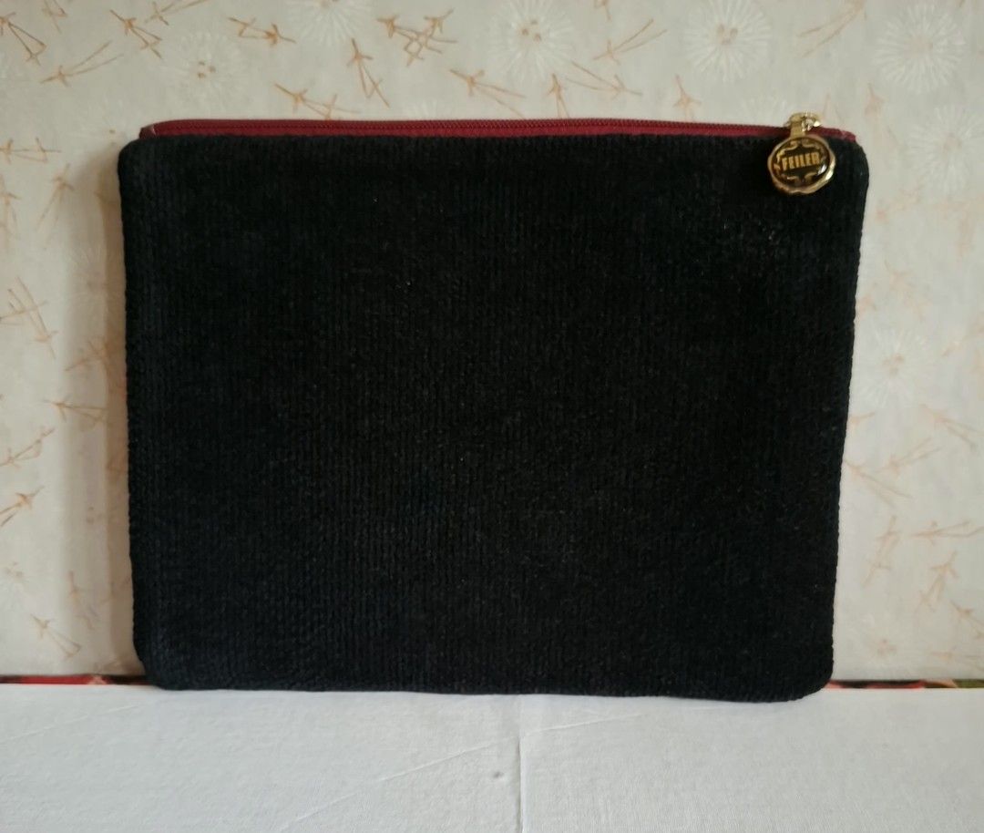 FEILER Black Red Rose Pouch (Category: Purses & Pouches) located in Don Carlos. Submitted by PphiXi_Finds (Listing ID 1457807778, Image 3). Description: - Cute FEILER pouch - Black background with vibrant red rose embroidery - Sparkly red accent details - Bright pink fabric lining inside - Secure zipper closure - Ideal for organizing small items or as a stylish pouch..