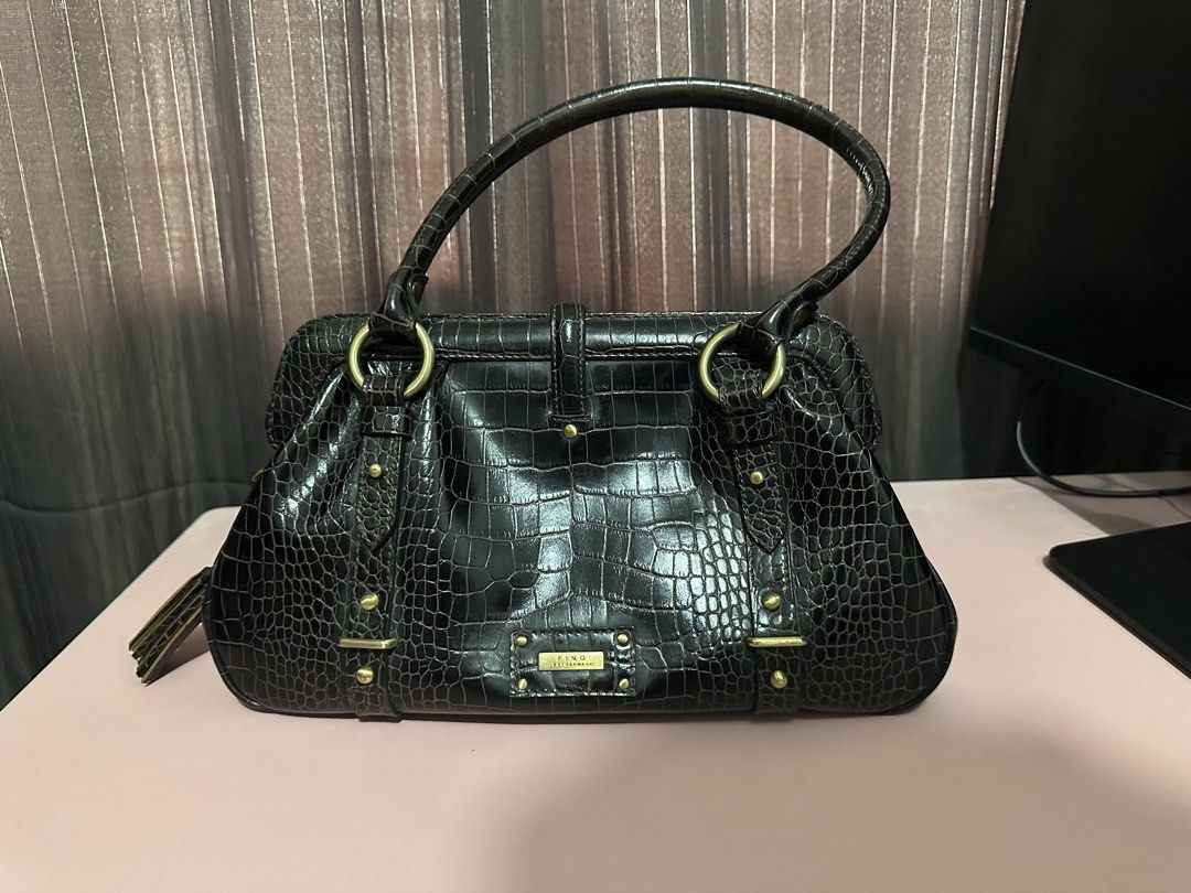 Fino Leatherware Bag (Category: Shoulder Bags) located in Rizal. Submitted by cruzj18 (Listing ID 1457815168, Image 1). Description: Beautiful, shiny crocodile leather bag from Fino Leatherware. Real , genuine leather Dark brown in color Can be carried as shoulderbag or handbag Shiny metal Fino plate with 1 zipper pocket and 4 open pocket inside This is so nice, looks brand new Clean, no odor All zippers working well.