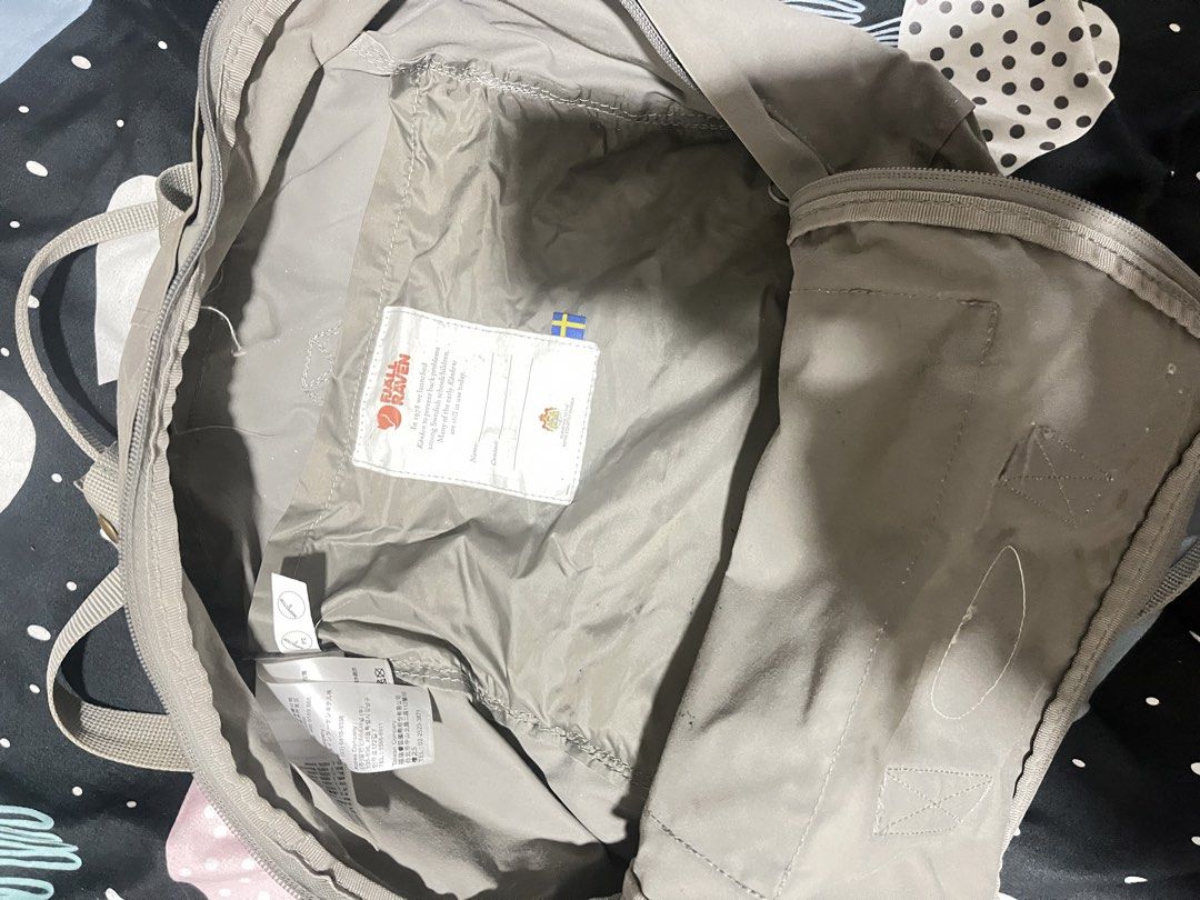 Fjallraven Kanken Backpack Grey (Category: Backpacks) located in Naga. Submitted by Carmel_C (Listing ID 1457862539, Image 3). Description: - Classic Fjallraven Kanken backpack - Color: Grey - Main compartment and front pocket - Zippers in good working condition - Adjustable straps for comfort - Features the iconic Fjallraven logo patch - Ideal for everyday use - Easily fits your daily essentials.