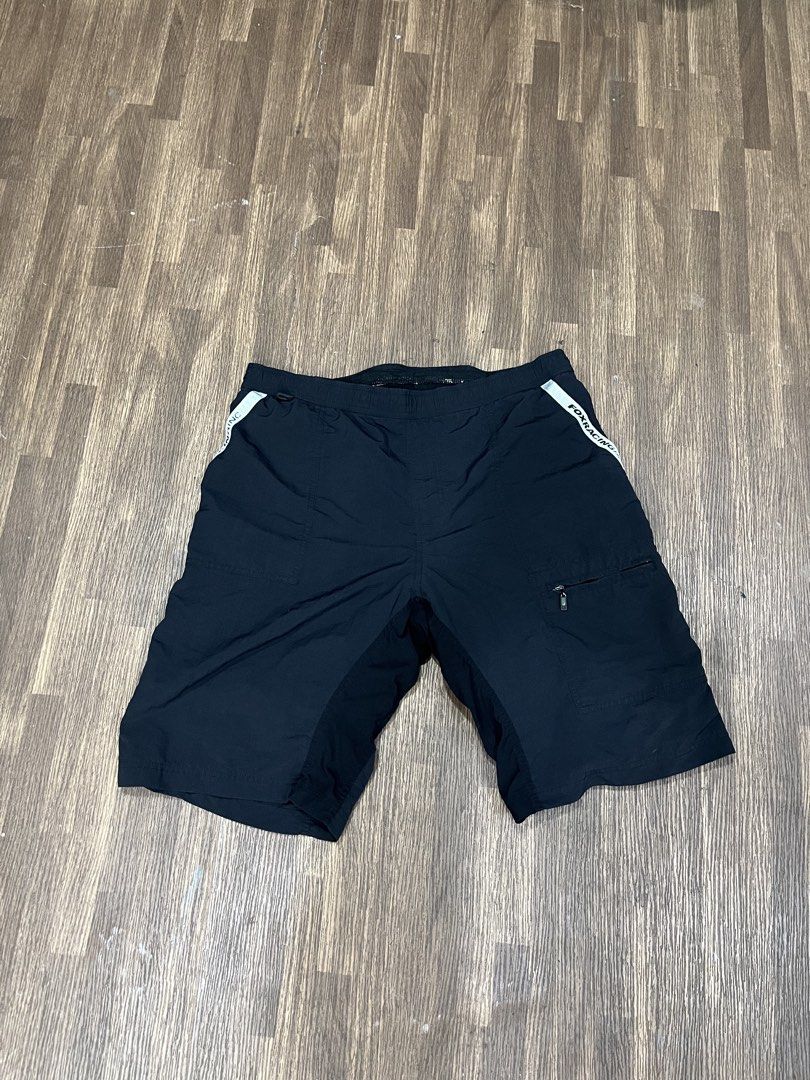 Fox Racing Black Cycling Shorts (Category: Activewear) located in Manila. Submitted by jortexxd (Listing ID 1457789554, Image 1). Description: - Brand: Black Fox Racing - Type: Cycling Shorts - Features: Zippered pocket (right side), elastic waistband with drawstring, Fox logo (front left leg & back right leg) - Accents: Light white details on waistband - Ideal for: Trail riding and cycling.