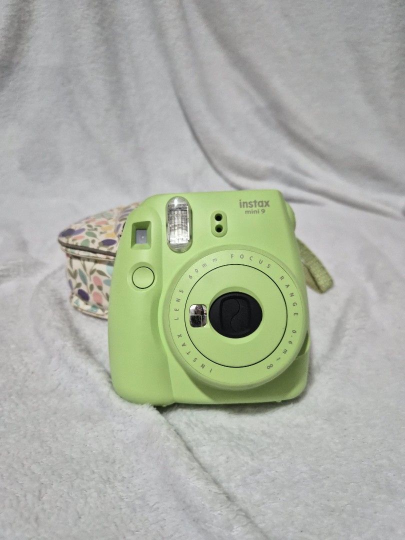 Fujifilm Instax Mini 9 Camera - Lime Green (Category: Cameras) located in Manila. Submitted by lsmrng (Listing ID 1457805471, Image 1). Description: - Fujifilm Instax Mini 9 Instant Camera - Color: Lime Green - Includes cute floral case and strap.