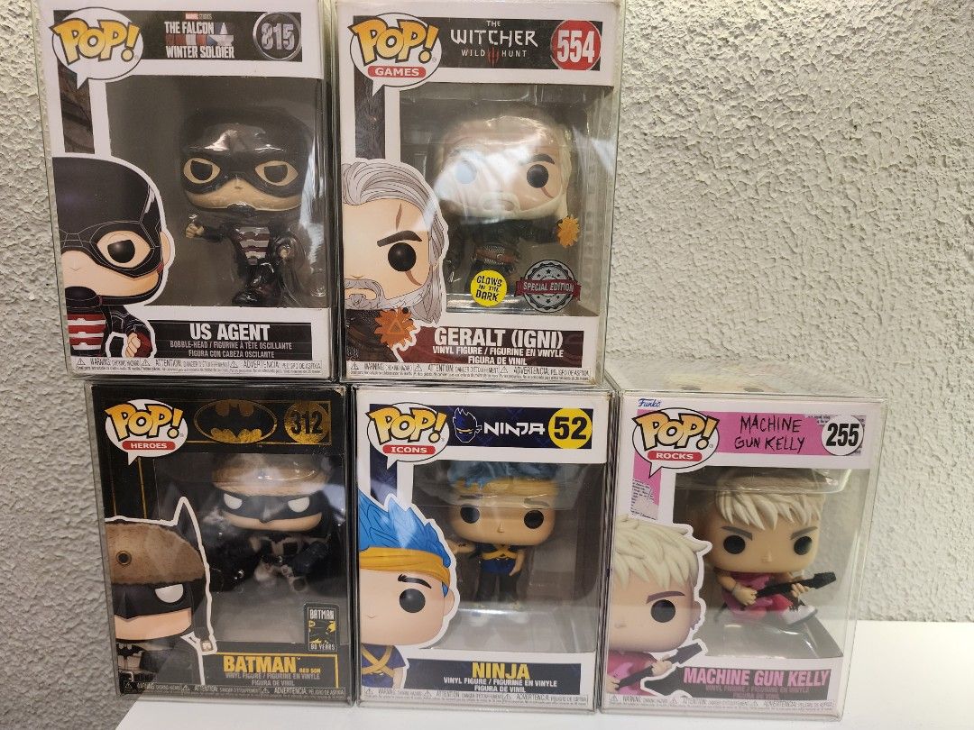 Funko Pop Figures - Marvel, Witcher, Ninja, NBA, Music (Category: Designer & Blind Box Toys) located in Manila. Submitted by kg613 (Listing ID 1457816485, Image 1). Description: - Funko Pop Collection for Sale! - Featuring popular characters from: - Marvel: The Falcon, The Winter Soldier, Batman - The Witcher: Geralt - Gaming/Pop Culture: Ninja, Machine Gun Kelly - NBA Legends: Michael Jordan, Magic Johnson, Larry Bird, and more! - Ideal for coll