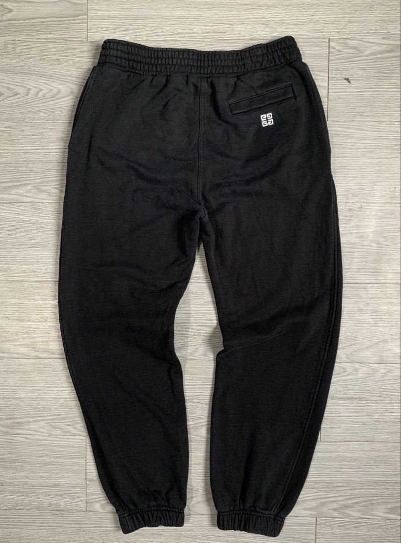 Givenchy Slim Fit Black Joggers (Category: Luxury Apparel) located in Pozorrubio. Submitted by plco. (Listing ID 1457859382, Image 2). Description: Givenchy Slim Fit Black Joggers with logo embroidery BM513U3Y78 M on tag W 29-34 L 38 color rate: 9.5/10 complete tags excellent condition no issue.