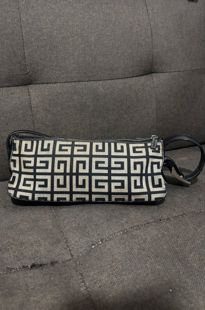 Givenchy Vintage 4G Monogram shoulder bag (Category: Luxury Bags & Wallets) located in Manila. Submitted by eryjohn.b (Listing ID 1457882082, Image 2). Description: Givenchy Vintage 4G Monogram Shoulder Bag Style: elongated/rectangular shoulder bag Material: 4G monogram canvas Colour: black & beige/grey Approx. dimensions: 10.6” × 3.9” × 3.