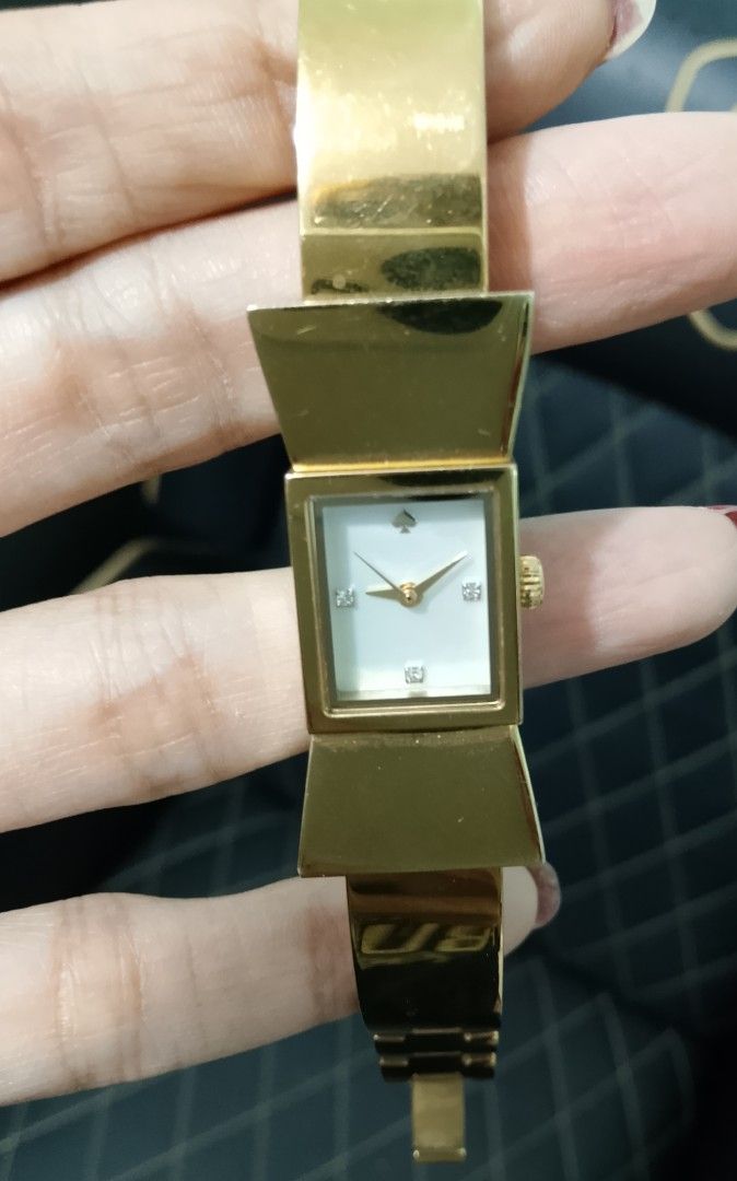 Gold Watch Bracelet (Category: Women's Watches) located in Paranaque City. Submitted by paras0620 (Listing ID 1457727414, Image 2). Description: preloved original Kate spade watch small size no box last price posted issue: please see the photo .