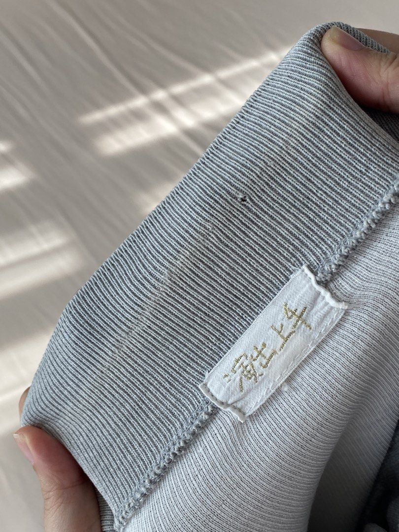 Grey Collared Sweatshirt with Embroidered Detail (Category: Longsleeves) located in Makati City. Submitted by dcltering_unicorn (Listing ID 1457891750, Image 3). Description: ♡ 𝙖𝙗𝙤𝙪𝙩 𝙩𝙝𝙚 𝙞𝙩𝙚𝙢 ♡ ✿ size: M (length: 21.5in ; width: 21.5 in ✿ color: grey ✿ style: long-sleeved sweatshirt with collared neckline with button closure ✿ issues: signs of usage (see photos) neckline is worn with tiny hole ✿ rfs: decluttering, too many sweaters ♡ 