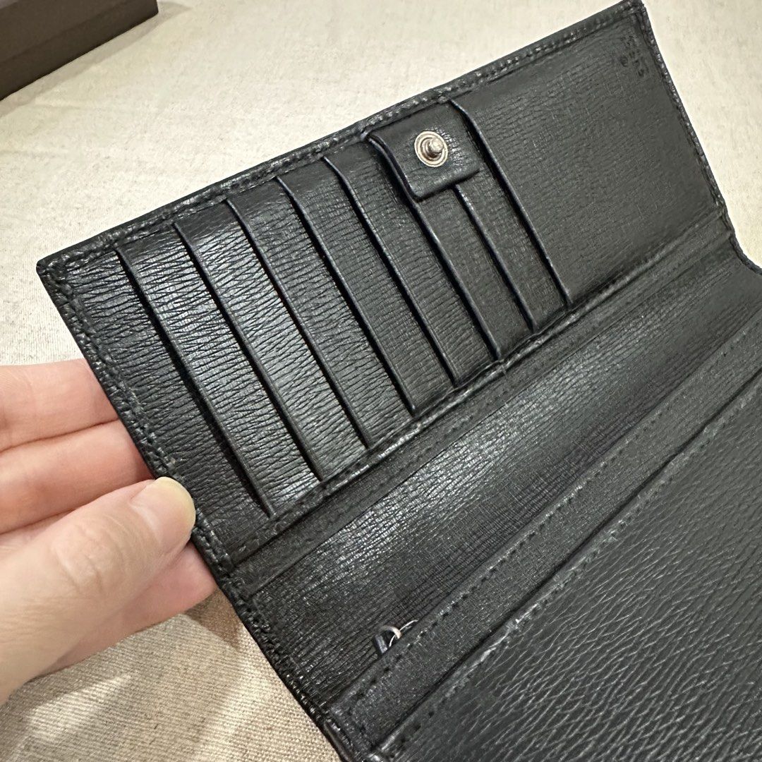 Gucci Black Leather Long Wallet with Box (Category: Luxury Bags & Wallets) located in Quezon City. Submitted by ariannelouise (Listing ID 1457799298, Image 3). Description: - Authentic Gucci long wallet - Black leather - Iconic GG logo hardware - Ample card slots for organization - Comes with original Gucci box -Calfskin leather.