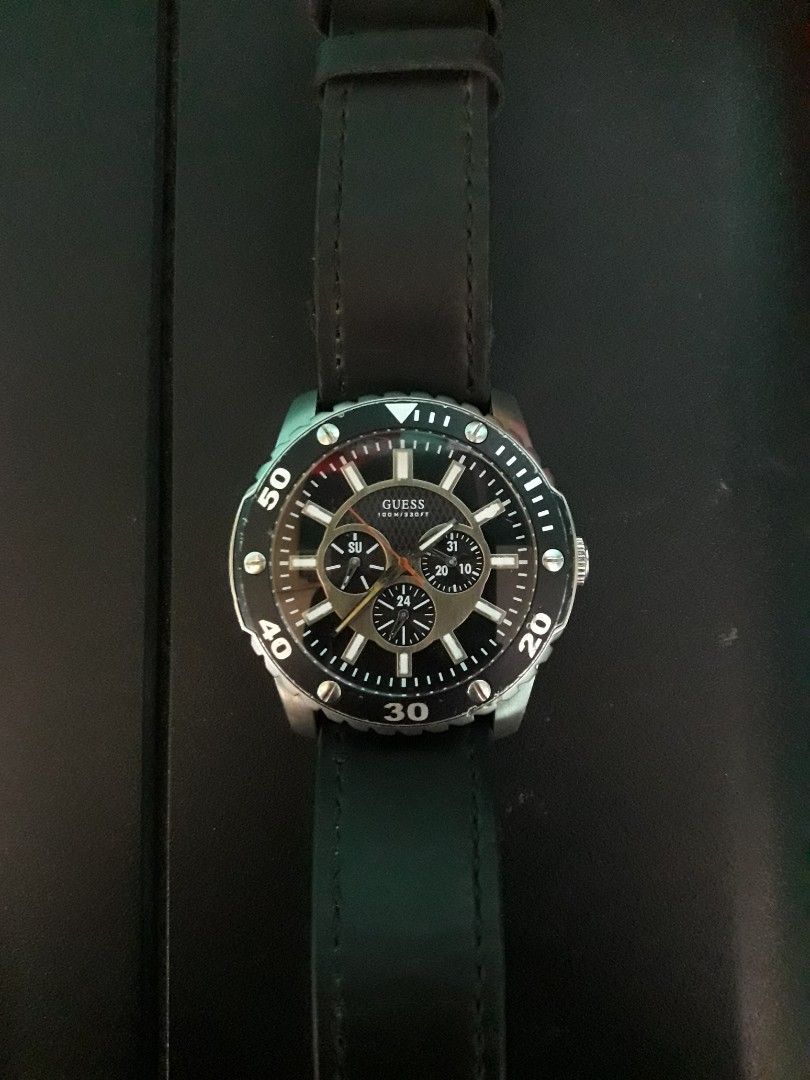 Guess Steel Chronograph Watch (Category: Men's Watches) located in Paranaque City. Submitted by omaraguirre (Listing ID 1457757342, Image 1). Description: - Black leather strap - Chronograph dial - Stainless steel case - Water resistant up to 100 meters (330 feet) - Ideal for everyday wear and swimming.