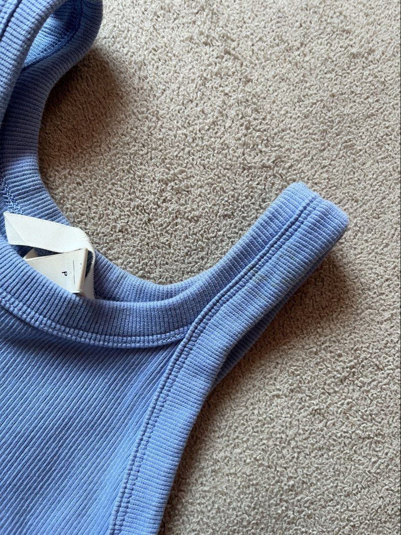 H&M Ribbed Light Blue Cottony Tank Top (Category: Sleeveless) located in Naga. Submitted by kitty_cate02 (Listing ID 1457723938, Image 3). Description: Used once In excellent condition minimal stain 3rd photo- washable - Blue ribbed tank top from H&M - Racerback style - Stretchable - Thick fabric - Approx. 17 inches length Authentic 💯.