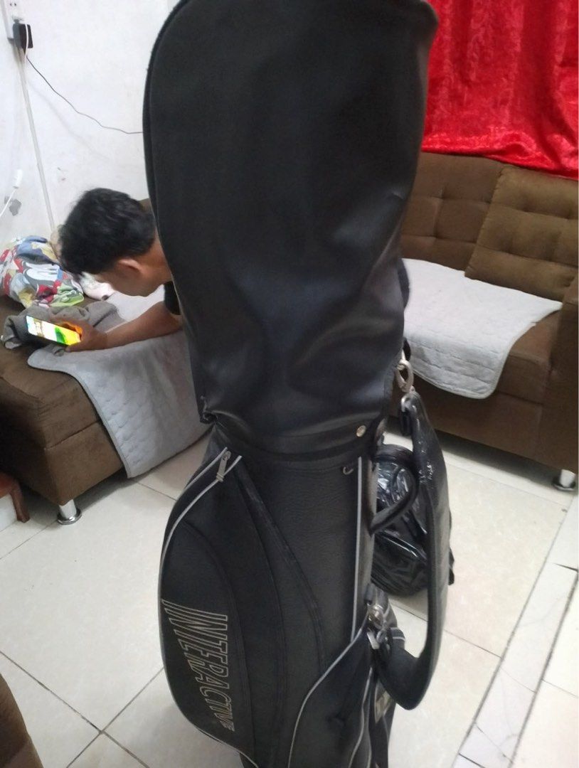 Interactive Golf Bag with PRGR CT-510 Golf Clubs (Category: Golf) located in Angeles City. Submitted by darkducci876 (Listing ID 1457820199, Image 1). Description: - Full set of PRGR CT-510 golf clubs - Includes drivers, irons (4-9, Pitching Wedge, Sand Wedge), and putter - Comes with an interactive golf bag - Bag is black with white trim - Perfect for golfers ready to hit the course.