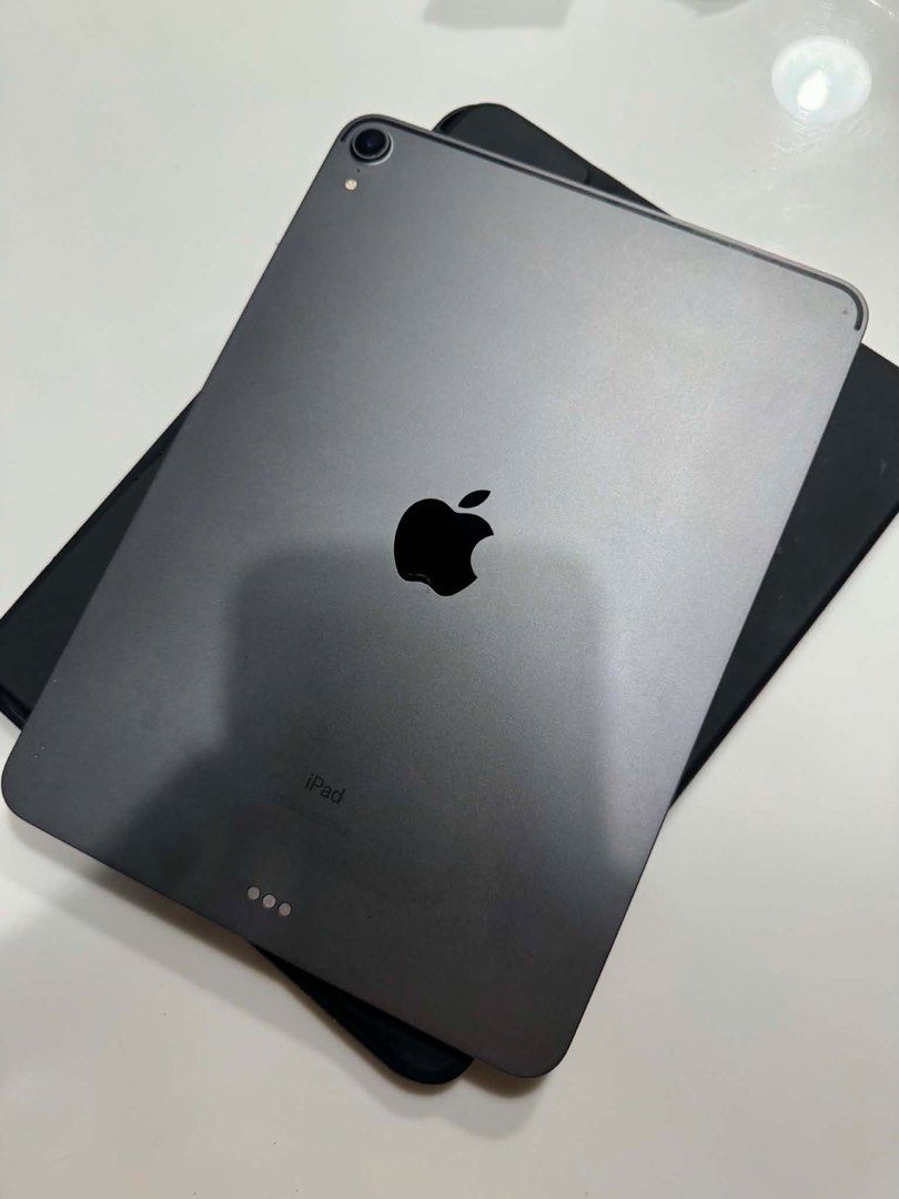 iPad Pro (1st Gen 2018 Model) (Category: iPad) located in Quezon City. Submitted by awwngel (Listing ID 1457810787, Image 1). Description: For sale! iPad Pro (11 inch) 1st Gen 2018 Model Finish: Space Gray Capacity: 256 GB Wifi Model Chip: A12x Bionic Chip iOS still updated (2026 Inclusion: Apple Pencil (2nd Gen; with minor stains and nib slightly scratched) with Tempered Glass (with minimal scratch) Silicone Case (with signs of usage) NO box and