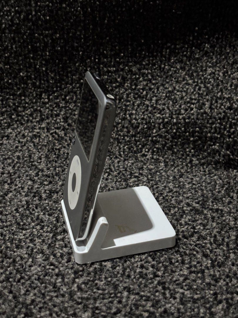 iPod Classic Silver 80Gb (Category: Portable Music Players) located in Bulacan. Submitted by thriftstarph (Listing ID 1457854517, Image 2). Description: PLEASE READ THE DESCRIPTION BELOW ‼️ iPod Classic (80GB) Charging Station (FREE) From: Japan Good Working: buttons charging port Issue: Minor scratches and battery life .