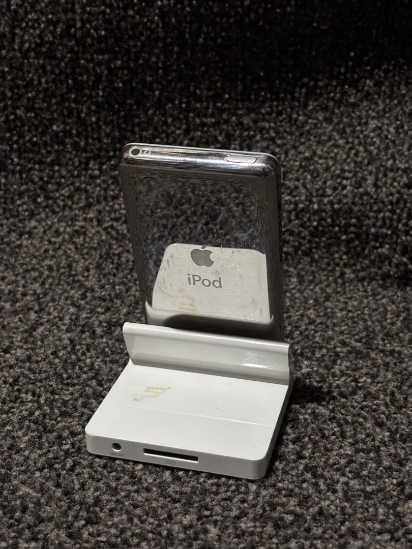 iPod Classic Silver 80Gb (Category: Portable Music Players) located in Bulacan. Submitted by thriftstarph (Listing ID 1457854517, Image 3). Description: PLEASE READ THE DESCRIPTION BELOW ‼️ iPod Classic (80GB) Charging Station (FREE) From: Japan Good Working: buttons charging port Issue: Minor scratches and battery life .