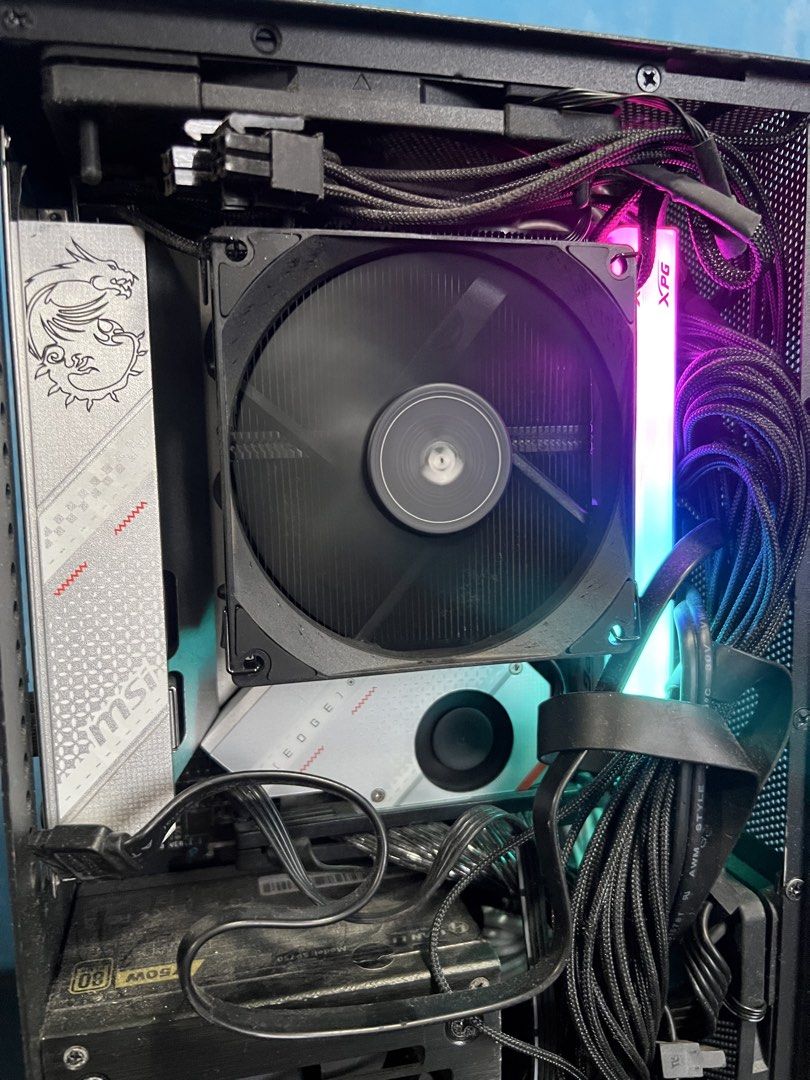 ITX Gaming System Unit Mid-High End AM5 (Category: Desktops) located in Manila. Submitted by cosmicbear-ead33b (Listing ID 1457804974, Image 3). Description: For Sale/Swap sa Lower System Unit or other Gadgets + Cash: Personal ITX Mid-High end AM5 Build Price: PHP 60,000 1 year old build, No Issue Full Specifications: CPU: AMD Ryzen 5 7600x Cooler: Thermalright AXP90-X53 Black Low Profile Motherboard: MSI B650i Edge WiFi RAM: 32GB 2x16 DDR5 6000M