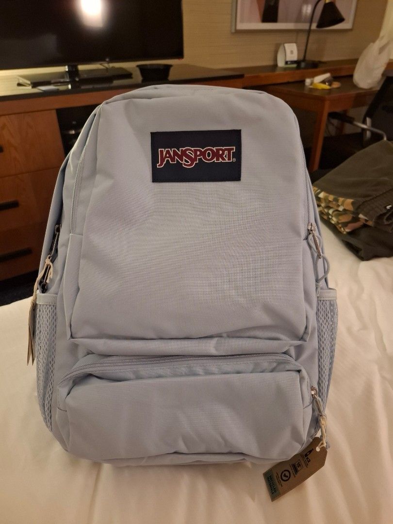 Jansport Backpack Light Blue (Category: Backpacks) located in Las Pinas. Submitted by kassiekaye (Listing ID 1457711721, Image 2). Description: - Brand new light blue Jansport backpack - Still has original tags attached - Spacious main compartment - Convenient front zippered pocket - Handy side mesh pockets - Ideal for school, work, or everyday adventures.