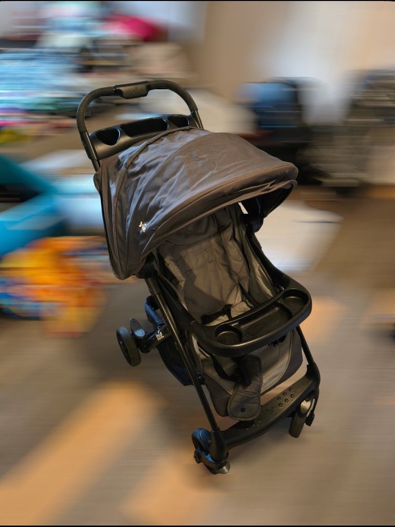 Joie Stroller - Grey (Category: Strollers) located in Quezon City. Submitted by modiiish.ph (Listing ID 1457726041, Image 1). Description: - Grey Joie LX Muze stroller - Compact and easy to fold - Includes tray and cup holders - Adjustable canopy - Ready for your little one.