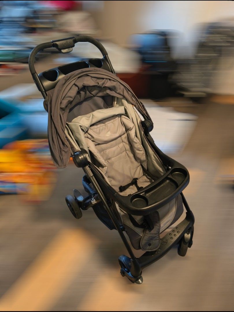 Joie Stroller - Grey (Category: Strollers) located in Quezon City. Submitted by modiiish.ph (Listing ID 1457726041, Image 2). Description: - Grey Joie LX Muze stroller - Compact and easy to fold - Includes tray and cup holders - Adjustable canopy - Ready for your little one.
