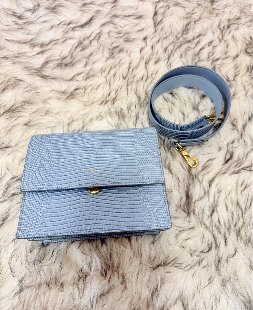 JW Pei Mini Flap Bag - Ice Croc (Category: Luxury Bags & Wallets) located in Makati City. Submitted by meyuuu.25 (Listing ID 1457711317, Image 2). Description: - JW Pei Mini Flap Bag - Color: Ice Croc (light blue) - Texture: Croc embossed - Hardware: Gold - Features: Detachable strap, interior zippered pocket - with signs of usage inside (see pics) - looks new outside.