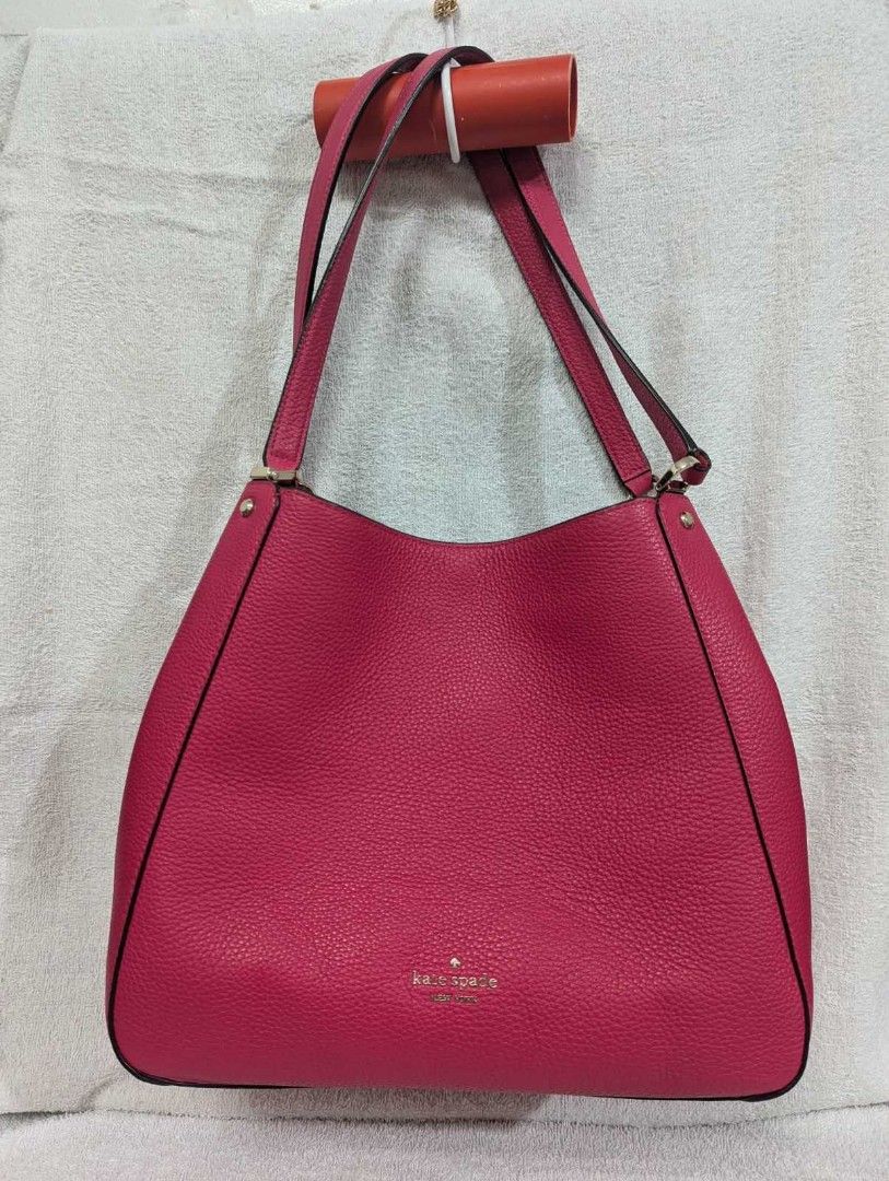 Kate Spade Pink Leather Shoulder Bag (Category: Luxury Bags & Wallets) located in Manila. Submitted by cdslzagala (Listing ID 1457738997, Image 1). Description: - Pink pebbled leather shoulder bag by Kate Spade - Classic hobo style with double straps - Silver-toned hardware - Spacious interior for essentials - Versatile for everyday or night out.