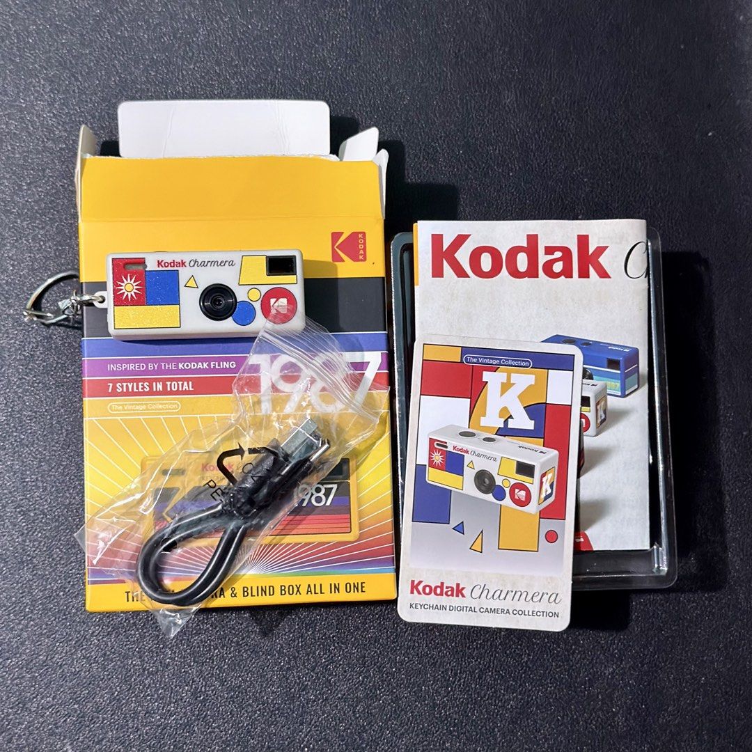 Kodak Charmera Keychain Digital Camera (Category: Cameras) located in Santa Rosa. Submitted by rmp_94 (Listing ID 1457848106, Image 2). Description: Price is negotiable 😊 - Super cute Kodak Charmera keychain digital camera - Inspired by the 1987 Kodak Fling - Includes camera, charging cable, and booklet - Great for collectors or as a fun accessory -SD Card not included.