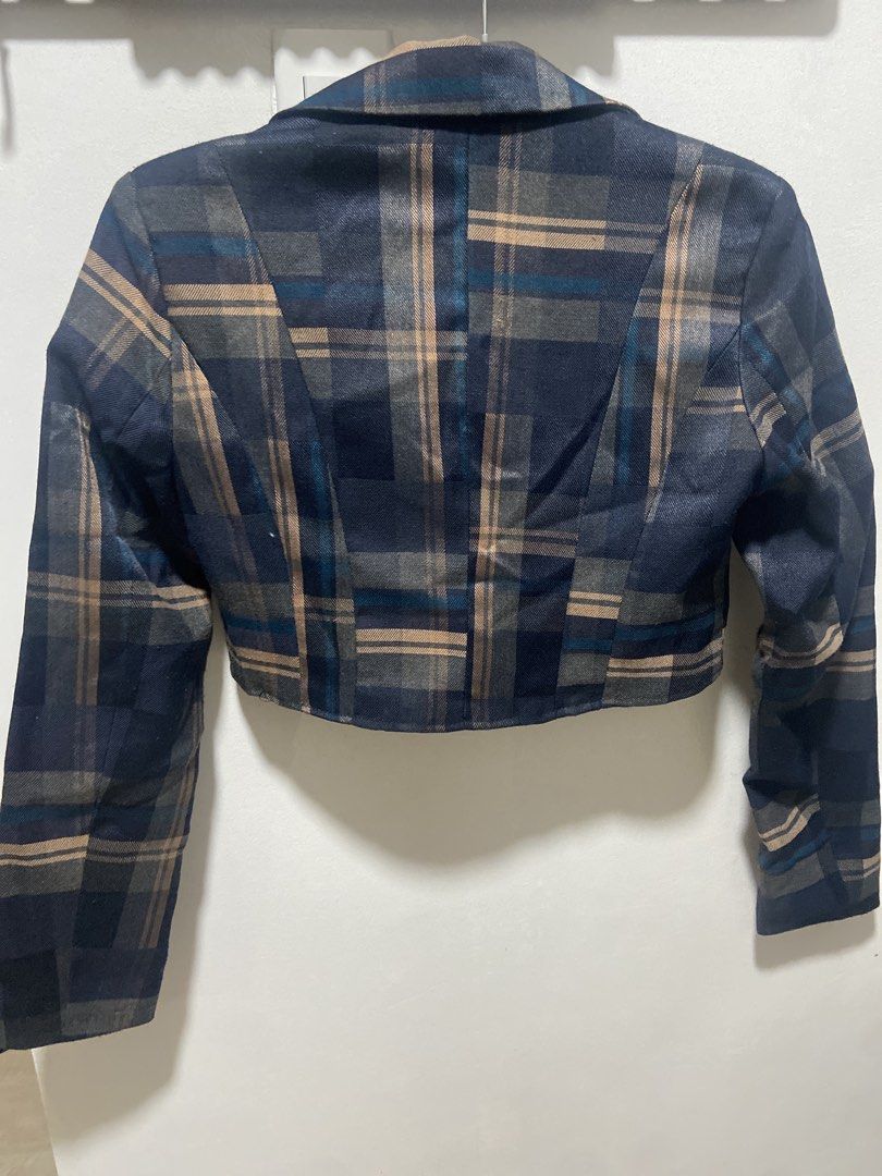 Korean Plaid Cropped Blazer Jacket (Category: Coats, Jackets and Outerwear) located in Makati City. Submitted by pink.velvet (Listing ID 1457786989, Image 3). Description: - Navy blue plaid cropped blazer - Single button closure -with a bit of shoulder paddings - Lapel collar - Long sleeves - Pairs well with high-waisted bottoms - Perfect for a smart casual outfit.
