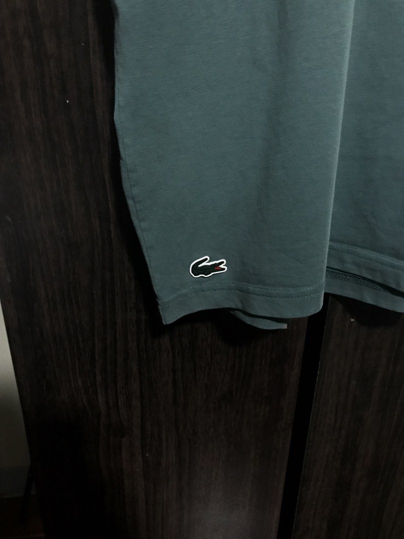 Lacoste Sport Shirt (Category: Tshirts & Polo Shirts ) located in Bulacan. Submitted by dailybumps (Listing ID 1457812534, Image 3). Description: 21x28 Authentic No issue M-L fittings.