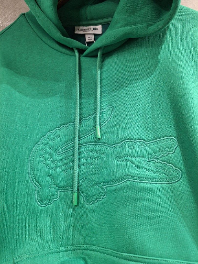 Lacoste pullover fleece hoodie green (Category: Coats, Jackets and Outerwear) located in Muntinlupa City. Submitted by kstefanomela14 (Listing ID 1457867895, Image 2). Description: Lacoste pullover hoddie sweater Small - 20x26 Medium - 21x27 Large - 22x28 XL - 23x29 Xxl - 24x30 Cod cop Lbc lalamove j&t.