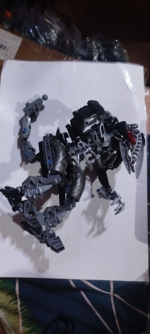 LEGO Bionicle Figures - Various Sets (Category: Lego & Building Sets) located in Quezon City. Submitted by mkarlranot (Listing ID 1457790759, Image 3). Description: - Collection of LEGO Bionicle figures. - Features several distinct characters. - Includes weapons and accessories. - Some figures are assembled, others may be partially disassembled. - Ideal for collectors and fans of the Bionicle universe. - All pieces shown in photos are included. -