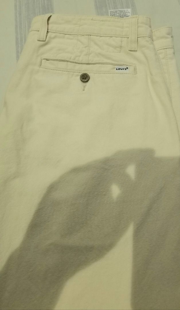 Levi's Cream Chino Jogger Pants (Category: Joggers) located in Quezon City. Submitted by eman438600 (Listing ID 1457840581, Image 3). Description: - Brand: Levi's - Color: Cream - Style: Chino Jogger Pants - Features: Elasticated cuffs, button and zip front closure, two side pockets, one buttoned back pocket - Occasion: Casual wear - Styling: Easy to pair with any top.