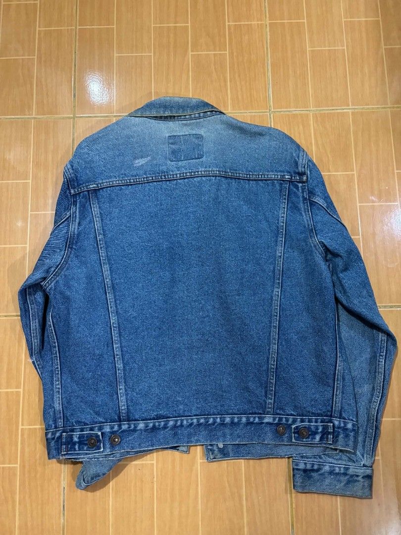 Levi's Denim Jacket - Classic Blue (Category: Coats, Jackets and Outerwear) located in Paranaque City. Submitted by poego (Listing ID 1457783819, Image 3). Description: - Classic blue Levi's denim jacket - Two chest pockets with button closure - Button front and cuffs - Standard trucker jacket style - Perfect for layering or wearing solo - A versatile addition to any wardrobe.