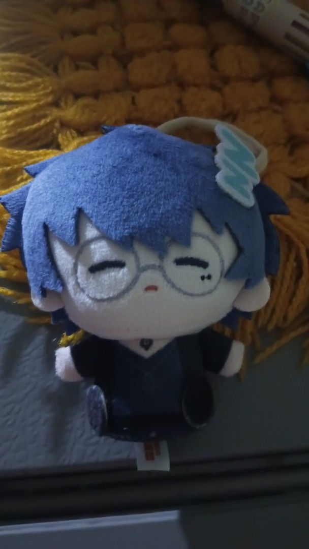 Liu Xiao | link click (Category: Plushies & Soft Toys) located in Itogon. Submitted by vastforest.91f3eb (Listing ID 1457893434, Image 1). Description: - Adorable blue-haired plush toy - Wears cute glasses - Features a small blue wing detail on its head - Dark blue outfit - Small tag at the bottom - Ideal for collectors or as a thoughtful gift.