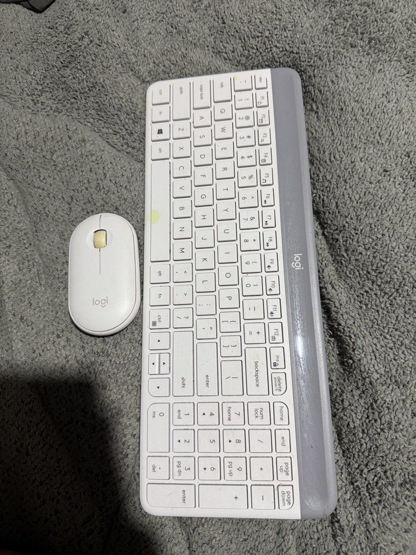 Logitech Wireless Keyboard and Mouse Combo (Category: Computer Keyboard) located in Manila. Submitted by theironjunee (Listing ID 1457711904, Image 1). Description: - Logitech Wireless Keyboard and Mouse Set - Color: White and Grey - Ideal for everyday home or office use - Both items are in good working condition - Keyboard features a full number pad - Mouse is compact and comfortable to hold - Wireless connectivity.