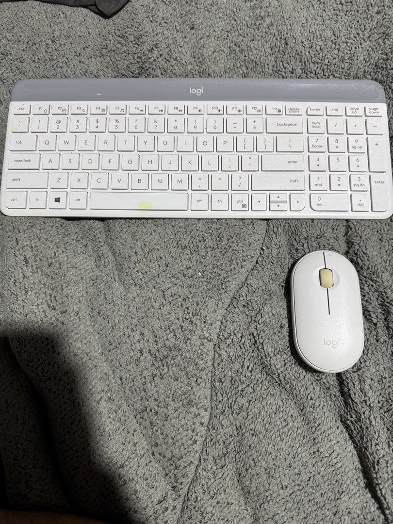 Logitech Wireless Keyboard and Mouse Combo (Category: Computer Keyboard) located in Manila. Submitted by theironjunee (Listing ID 1457711904, Image 2). Description: - Logitech Wireless Keyboard and Mouse Set - Color: White and Grey - Ideal for everyday home or office use - Both items are in good working condition - Keyboard features a full number pad - Mouse is compact and comfortable to hold - Wireless connectivity.