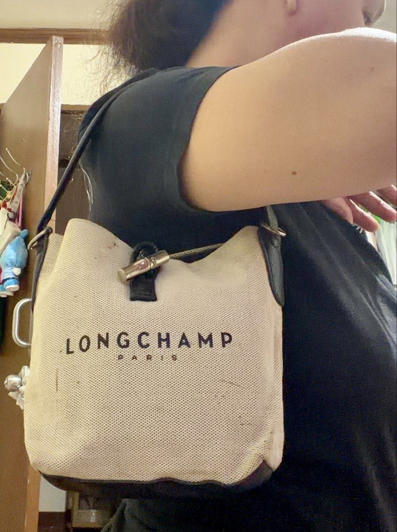 LONGCHAMP SMALL ROSEAU CANVAS. BUCKET BAG (Category: Luxury Bags & Wallets) located in Paranaque City. Submitted by lyn0618 (Listing ID 1457814412, Image 1). Description: FOR SALE! LONGCHAMP SMALL ROSEAU BUCKET CANVAS BAG PRE LOVED ITEM. MANAGE YOIR EXPECTATIONS WHEN BUYING A PRE LOVED ITEM. ISSUE: CANVASS CLOTH NEED WASH. STOCK STAIN. WASHABLE. by soft. Detergent. MISSING CROSSBODY. STRAP. Bili nlng kayo Ng replace strap. PASS SA MASELAN . PRE L