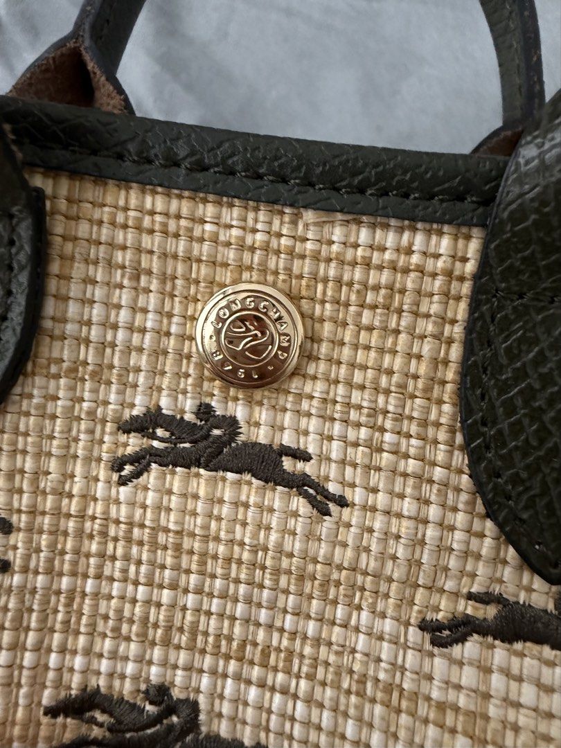 Longchamp XS sling bag in rattan (Category: Cross-body Bags) located in Quezon City. Submitted by ono11 (Listing ID 1457761013, Image 2). Description: Barely used Authentic Longchamp in rattan XS.