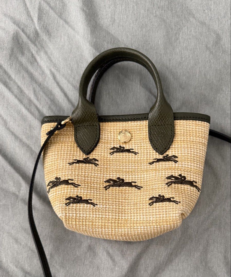 Longchamp XS sling bag in rattan (Category: Cross-body Bags) located in Quezon City. Submitted by ono11 (Listing ID 1457761013, Image 1). Description: Barely used Authentic Longchamp in rattan XS.