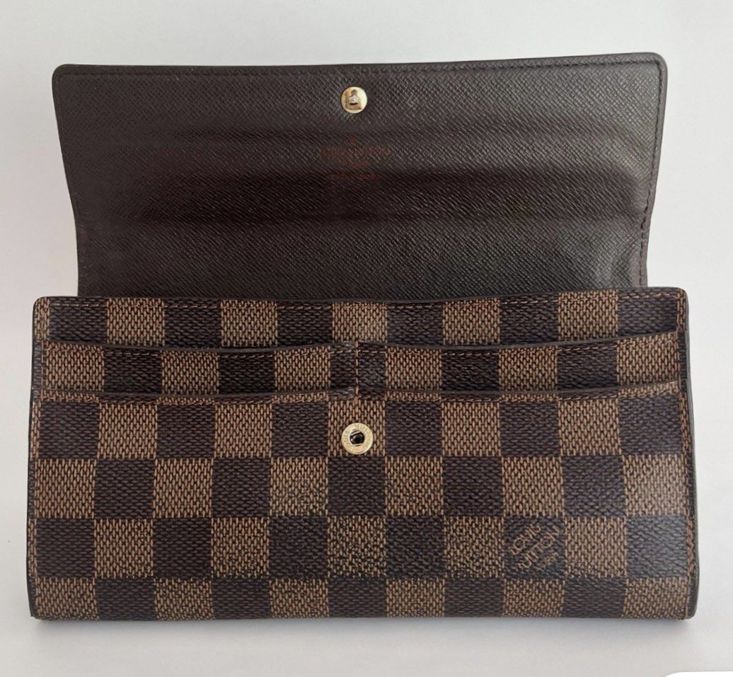 Louis Vuitton Damier Ebene Long Wallet (Category: Luxury Bags & Wallets) located in Manila. Submitted by alldayshoppinggirl (Listing ID 1457577266, Image 2). Description: 💯 ORIGINAL 🇯🇵 JAPAN BOUGHT ❤️NEGOTIABLE Classic Louis Vuitton Damier Ebene Long Wallet in the iconic brown check coated canvas with its original box, dust bag, and envelope containing product documentation Text or pm for faster transaction.