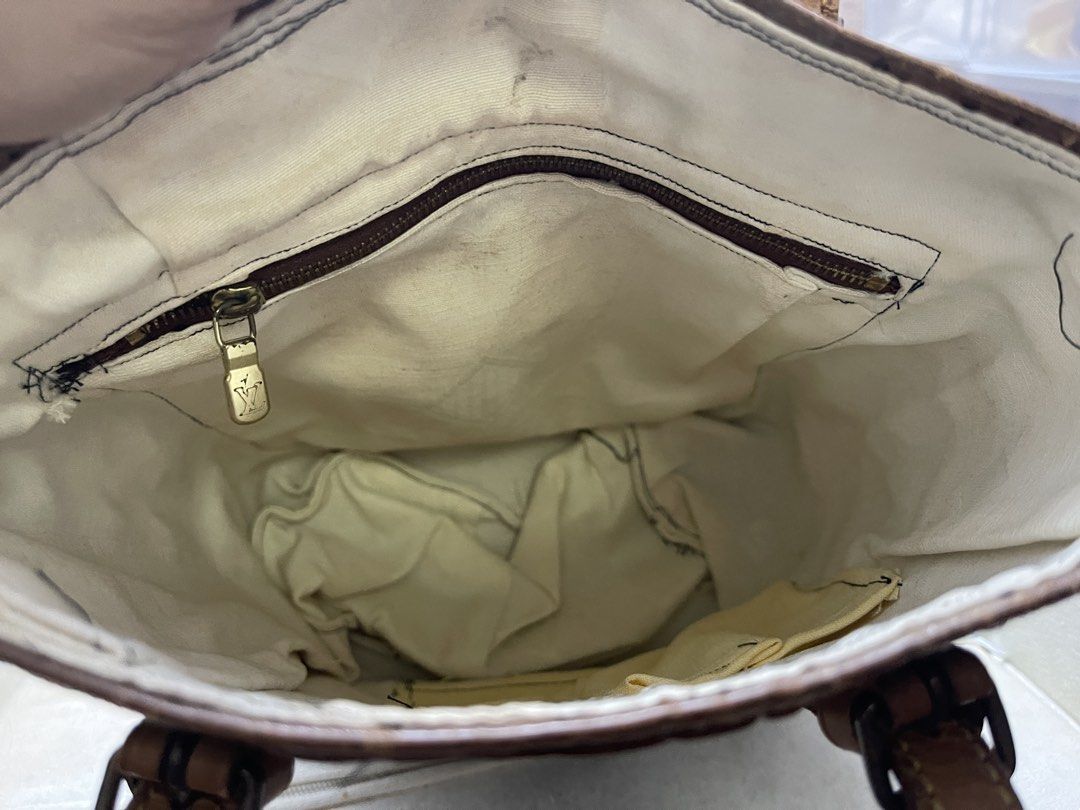 Louis Vuitton Monogram Bucket Bag (Category: Luxury Bags & Wallets) located in Aparri. Submitted by laheybels (Listing ID 1457810560, Image 2). Description: Classic Louis Vuitton bucket bag in monogram canvas. Leather trim and straps. Interior has a zippered pocket. Base has protective studs. A timeless piece for your collection. Shows some signs of wear on the leather and interior lining..