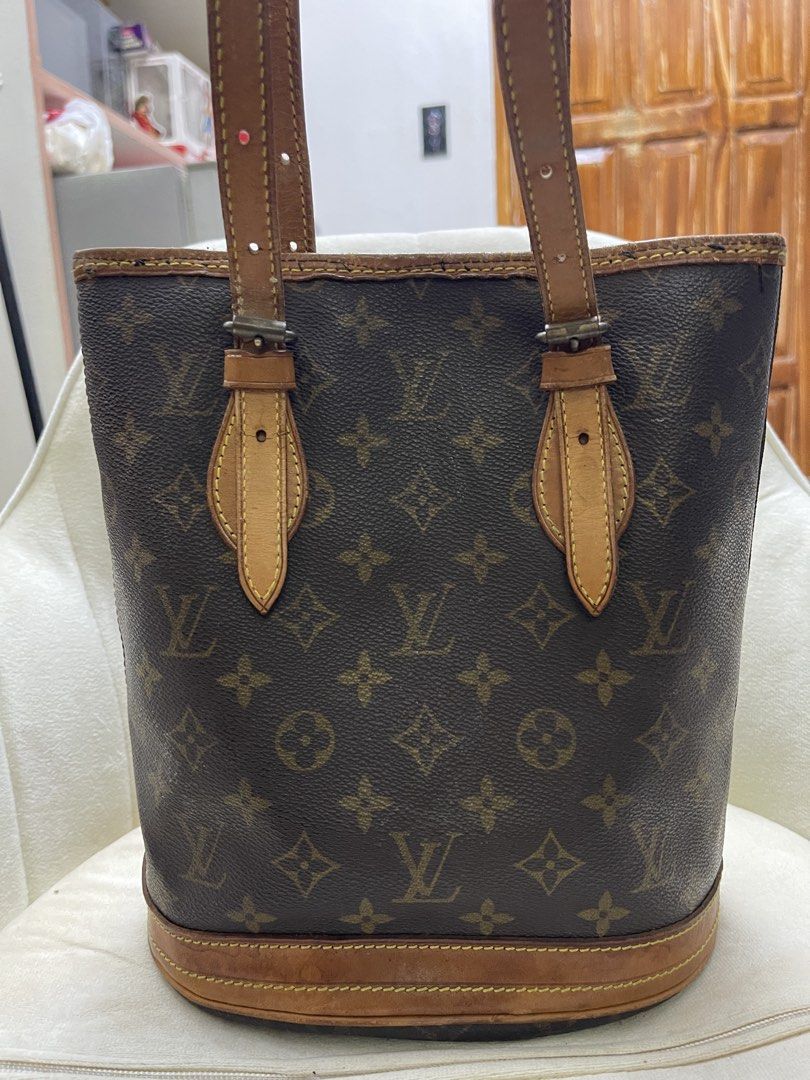 Louis Vuitton Monogram Bucket Bag (Category: Luxury Bags & Wallets) located in Aparri. Submitted by laheybels (Listing ID 1457810560, Image 1). Description: Classic Louis Vuitton bucket bag in monogram canvas. Leather trim and straps. Interior has a zippered pocket. Base has protective studs. A timeless piece for your collection. Shows some signs of wear on the leather and interior lining..