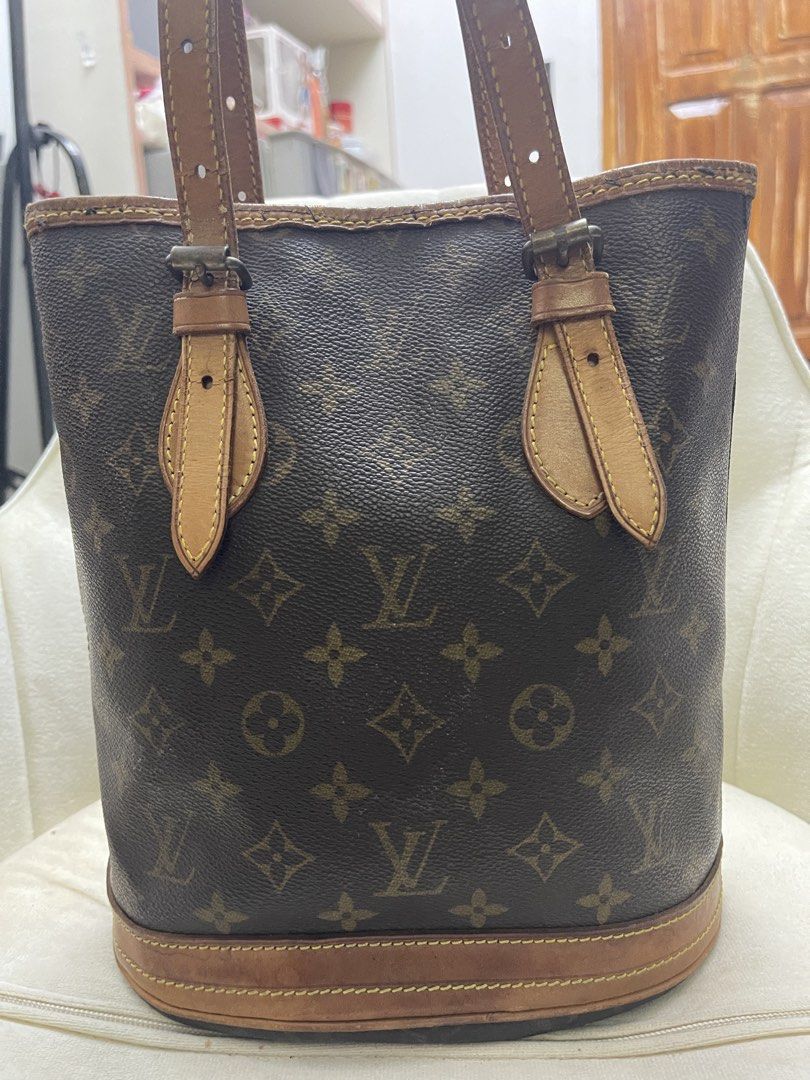 Louis Vuitton Monogram Bucket Bag (Category: Luxury Bags & Wallets) located in Aparri. Submitted by laheybels (Listing ID 1457810560, Image 3). Description: Classic Louis Vuitton bucket bag in monogram canvas. Leather trim and straps. Interior has a zippered pocket. Base has protective studs. A timeless piece for your collection. Shows some signs of wear on the leather and interior lining..