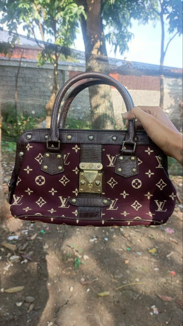 Louis Vuitton Monogram Canvas & Croc Embossed Leather Handbag (Category: Luxury Bags & Wallets) located in Kidapawan. Submitted by azythrift (Listing ID 1457797548, Image 1). Description: - Authentic Louis Vuitton handbag - Burgundy monogram canvas with brown croc embossed leather accents - Gold-tone hardware - Zipper closure - Leather lining with "Louis Vuitton Paris Made in France" stamp - Grab handles for carrying - A classic, timeless piece.
